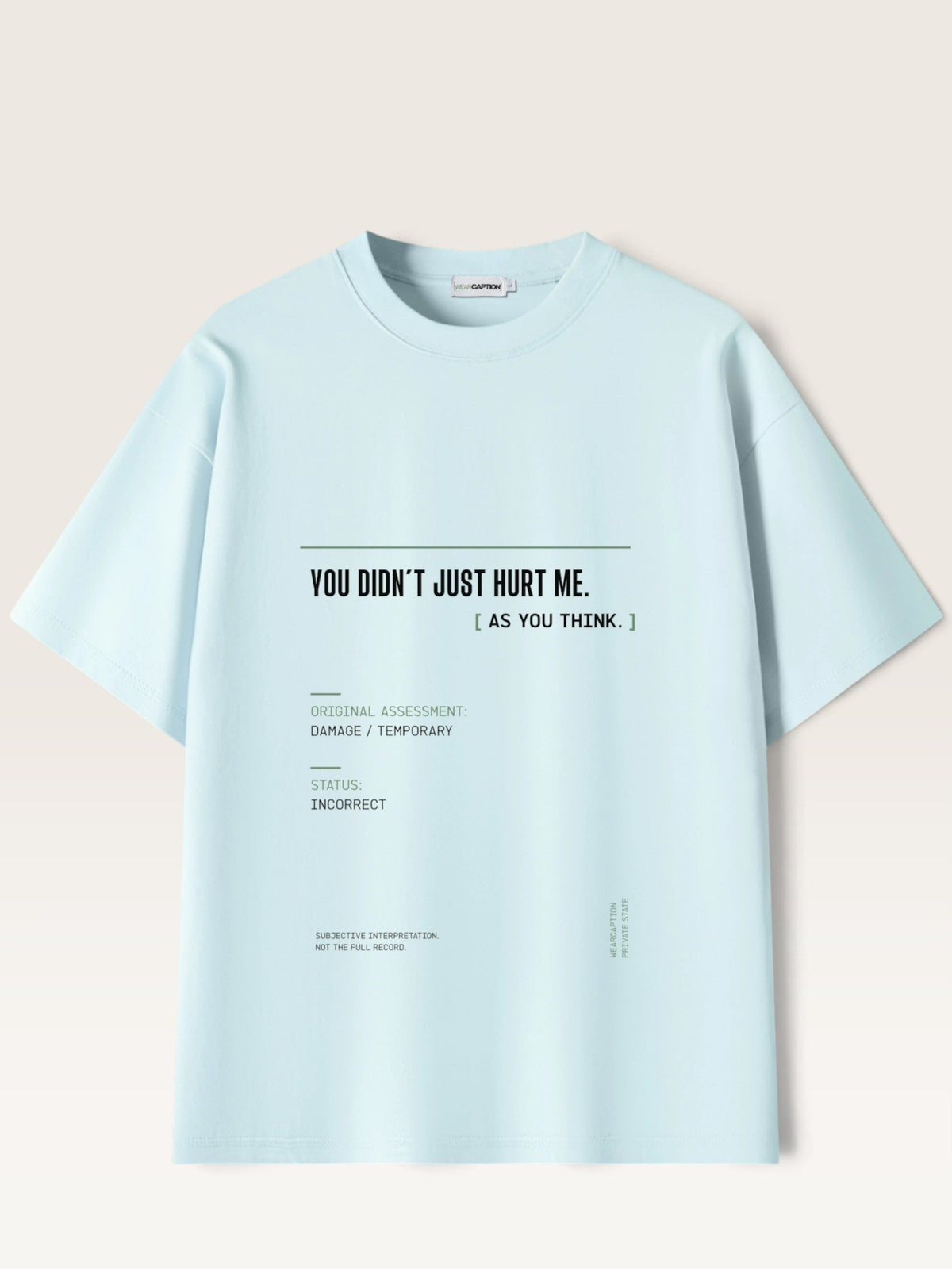 Sky Blue - A light blue oversized short-sleeve t-shirt with black printed text on the front reading 'YOU DIDN'T JUST HURT ME. [ AS YOU THINK.