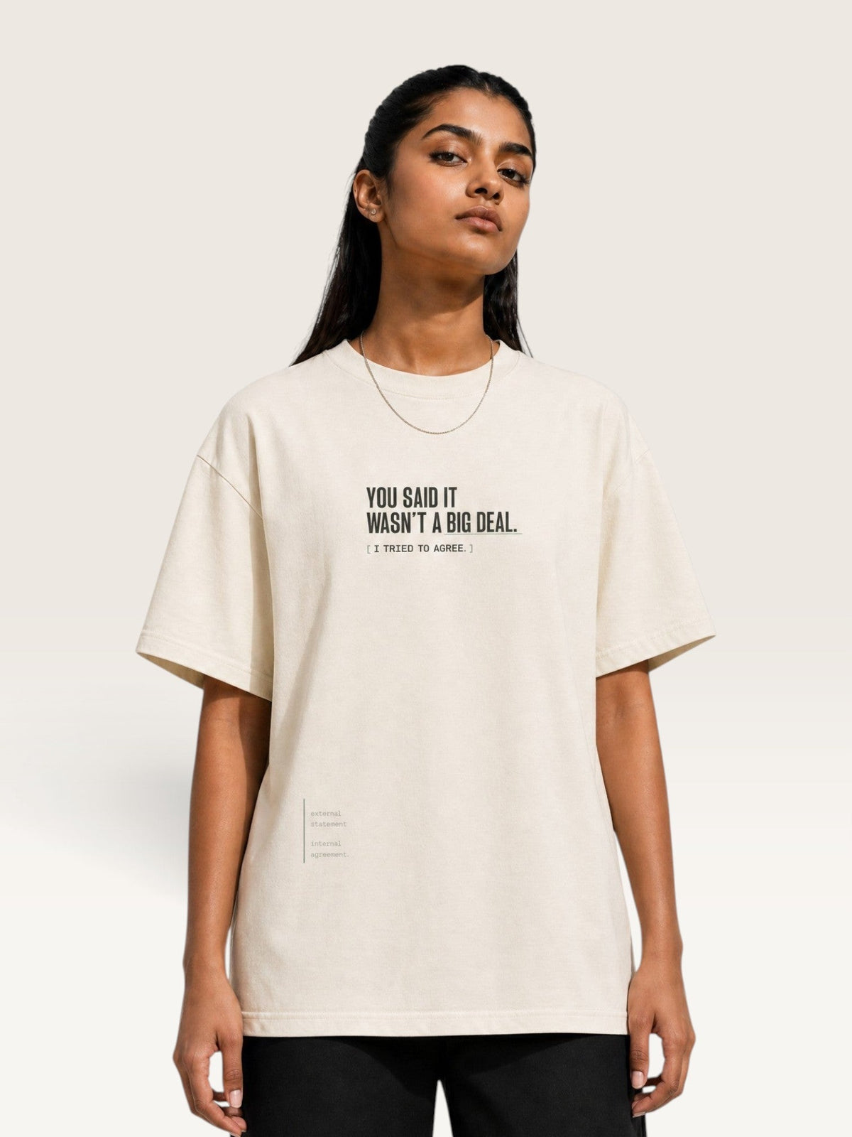 Mild Apricot - heavyweight cotton oversized t-shirt with white IT WASN'T A BIG DEAL graphic print on the back