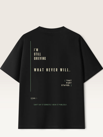 Black - heavyweight cotton oversized t-shirt with white I'M OVER WHAT HAPPENED graphic print on the back