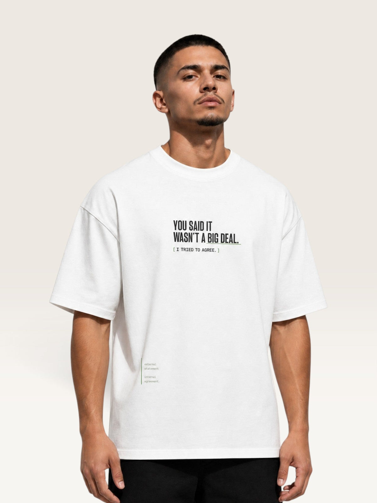 White - heavyweight cotton oversized t-shirt with white IT WASN'T A BIG DEAL graphic print on the back