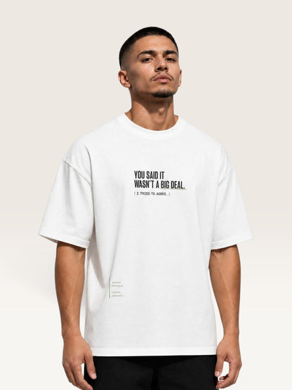 White - heavyweight cotton oversized t-shirt with white IT WASN'T A BIG DEAL graphic print on the back