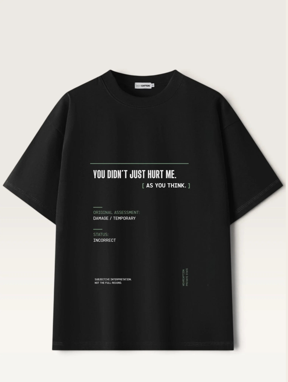 Black - short-sleeve t-shirt shown from the back, featuring a white typographic graphic with text and a minimalist terminal-style design on a light beige background.