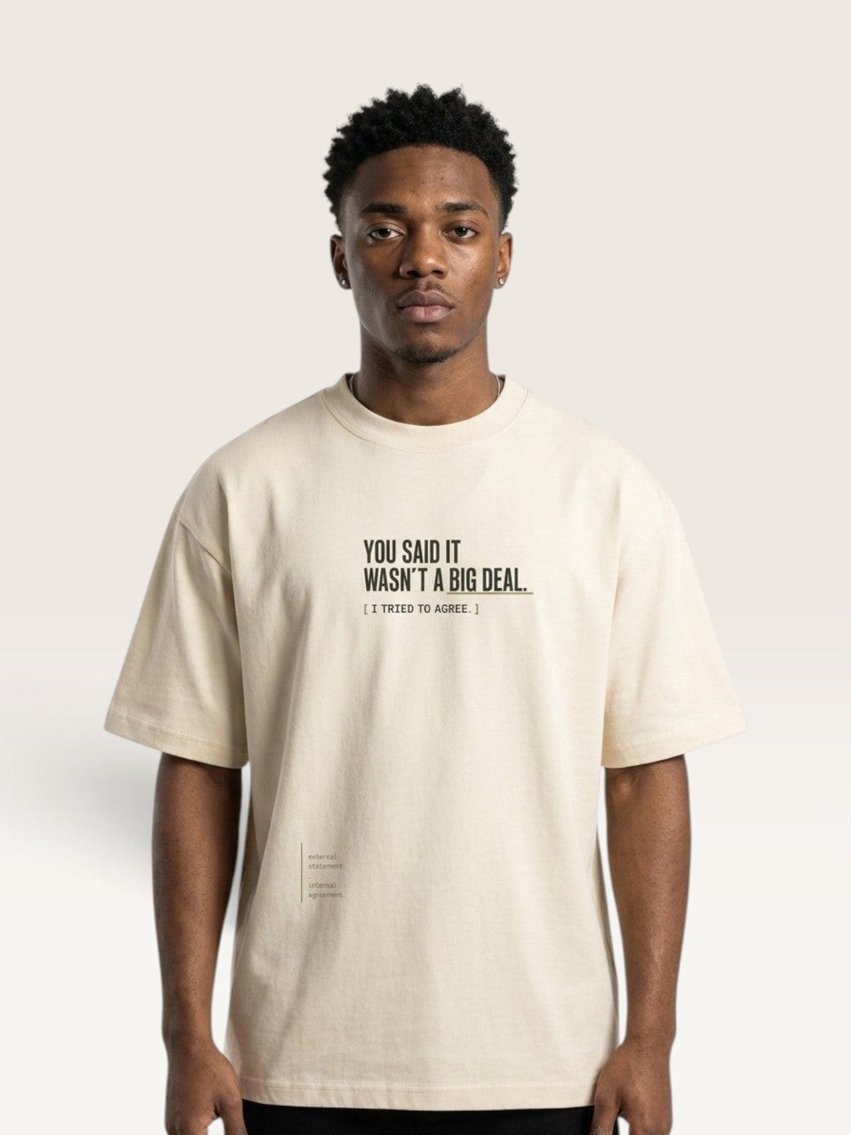 Mild Apricot - heavyweight cotton oversized t-shirt with white IT WASN'T A BIG DEAL graphic print on the front