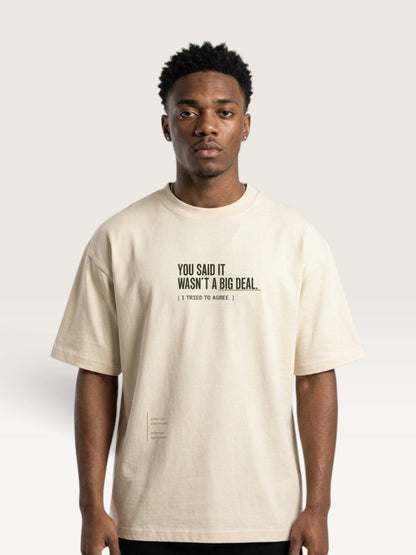 Mild Apricot - heavyweight cotton oversized t-shirt with white IT WASN'T A BIG DEAL graphic print on the front