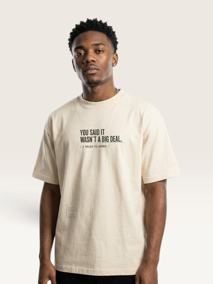 Mild Apricot - heavyweight cotton oversized t-shirt with white IT WASN'T A BIG DEAL graphic print on the back