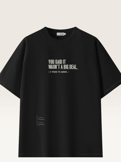 Black - heavyweight cotton oversized t-shirt with white IT WASN'T A BIG DEAL graphic print on the front