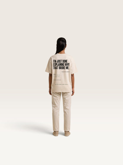 Mild Apricot WEARCAPTION heavyweight cotton oversized t-shirt with white I'M NOT COLD graphic print on the chest.