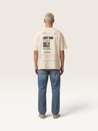 Mild Apricot WEARCAPTION  heavyweight cotton oversized t-shirt with NOTHING HAPPENED PUBLIC VERSION graphic print