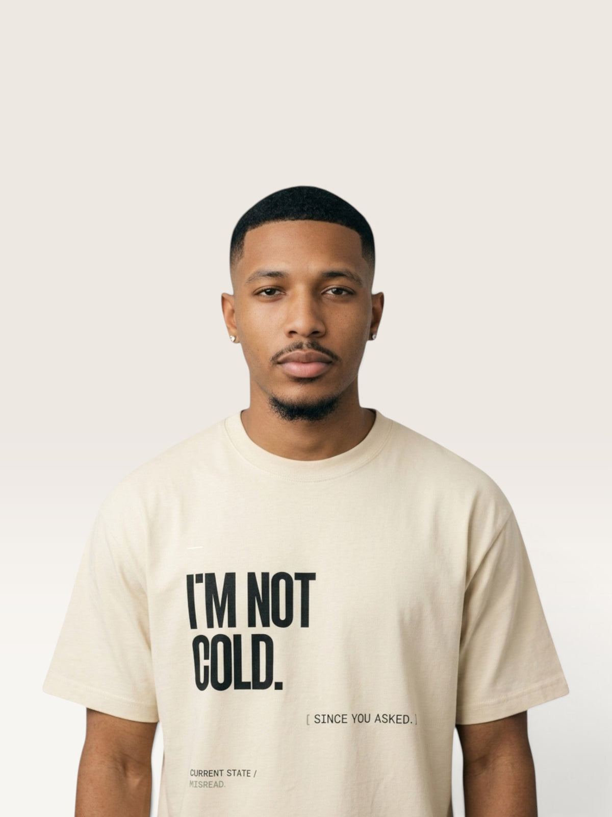Mild Apricot WEARCAPTION heavyweight cotton oversized t-shirt with white I'M NOT COLD graphic print on the chest.