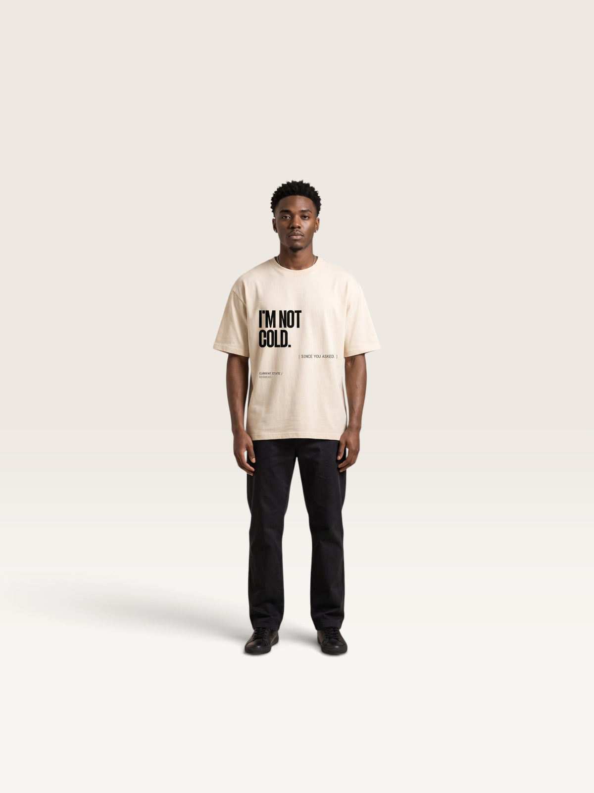 Mild Apricot WEARCAPTION heavyweight cotton oversized t-shirt with white I'M NOT COLD graphic print on the chest.