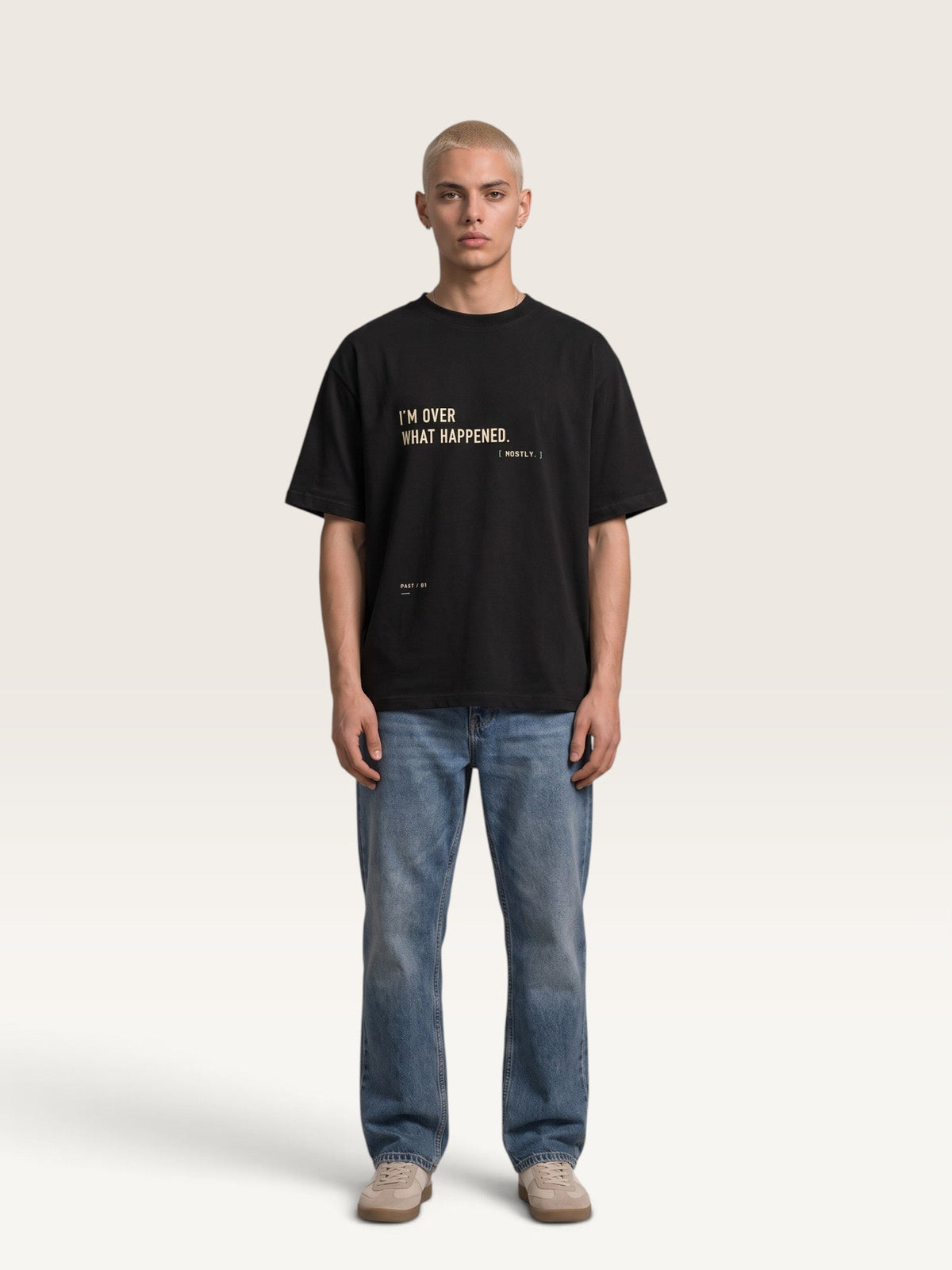 WEARCAPTION black heavyweight cotton oversized t-shirt with I'M OVER WHAT HAPPENED graphic print on a male model