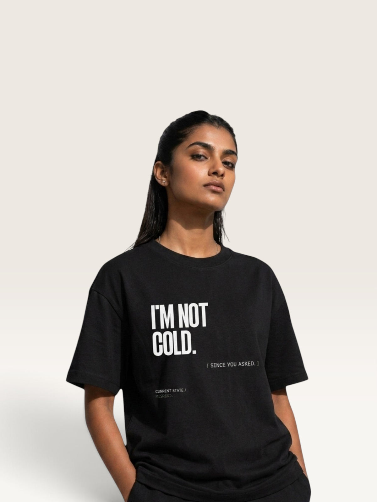 Black WEARCAPTION heavyweight cotton oversized t-shirt with white I'M NOT COLD graphic print on the chest.