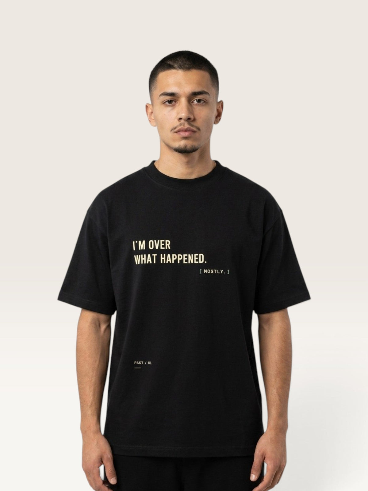 WEARCAPTION black heavyweight cotton oversized t-shirt with I'M OVER WHAT HAPPENED text print on the chest