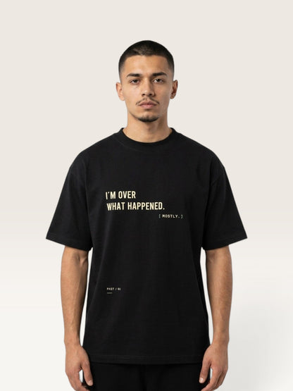WEARCAPTION black heavyweight cotton oversized t-shirt with I'M OVER WHAT HAPPENED text print on the chest