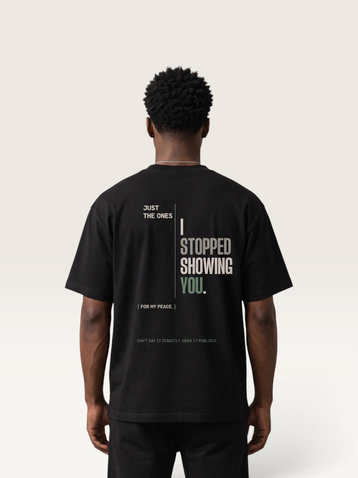 Black heavyweight cotton oversized t-shirt with white NO HARD FEELINGS A LIE text print on the front