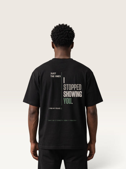 Black heavyweight cotton oversized t-shirt with white NO HARD FEELINGS A LIE text print on the front
