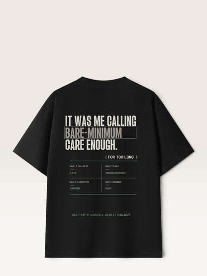 Black WEARCAPTION heavyweight cotton oversized t-shirt with white and green graphic text print on the back