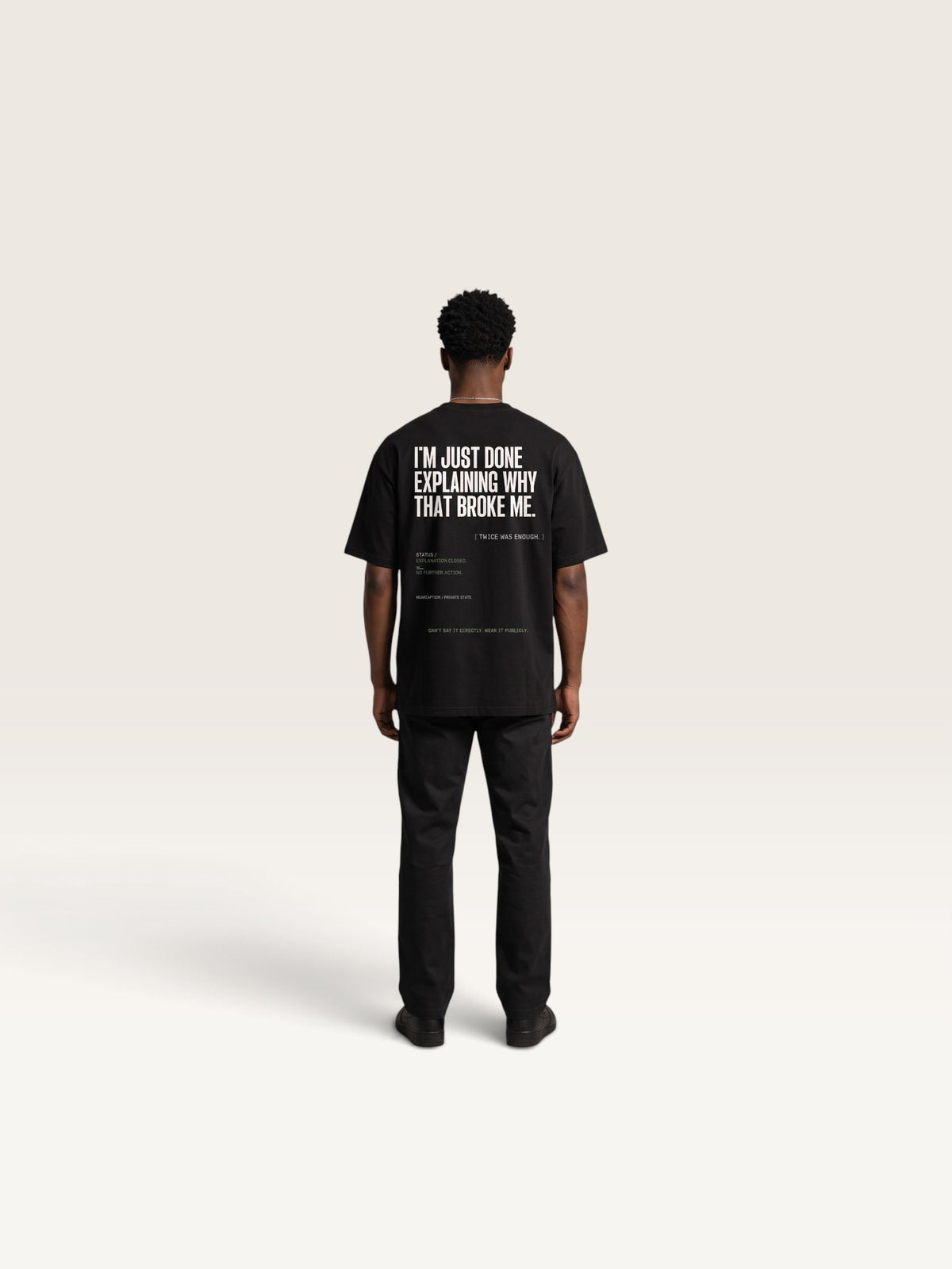 Black WEARCAPTION heavyweight cotton oversized t-shirt with white I'M NOT COLD graphic print on the chest.