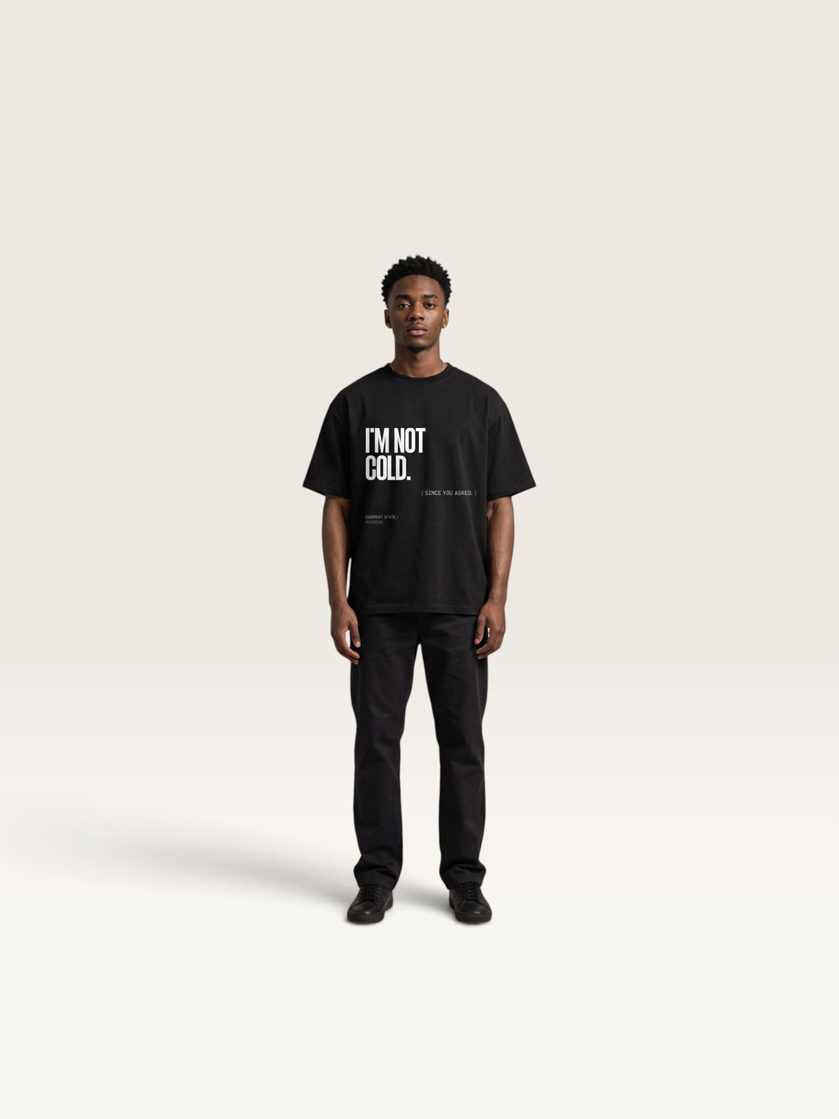 Black WEARCAPTION heavyweight cotton oversized t-shirt with white I'M NOT COLD graphic print on the chest.