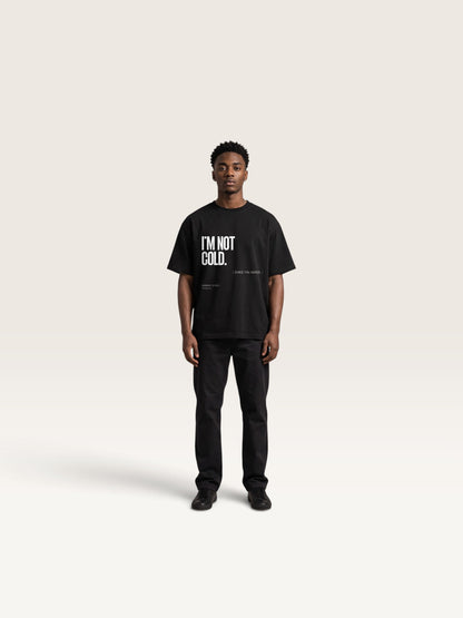 Black WEARCAPTION heavyweight cotton oversized t-shirt with white I'M NOT COLD graphic print on the chest.