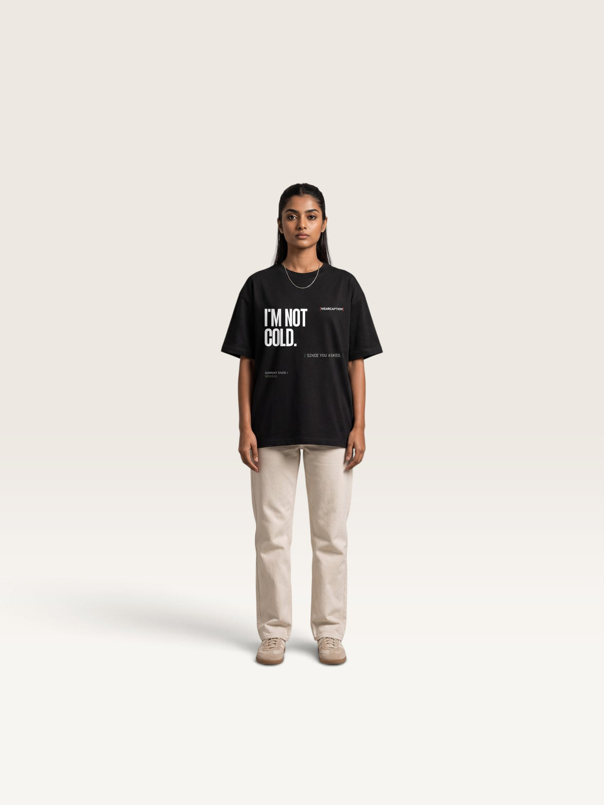 Black WEARCAPTION heavyweight cotton oversized t-shirt with white I'M NOT COLD graphic print on the chest.
