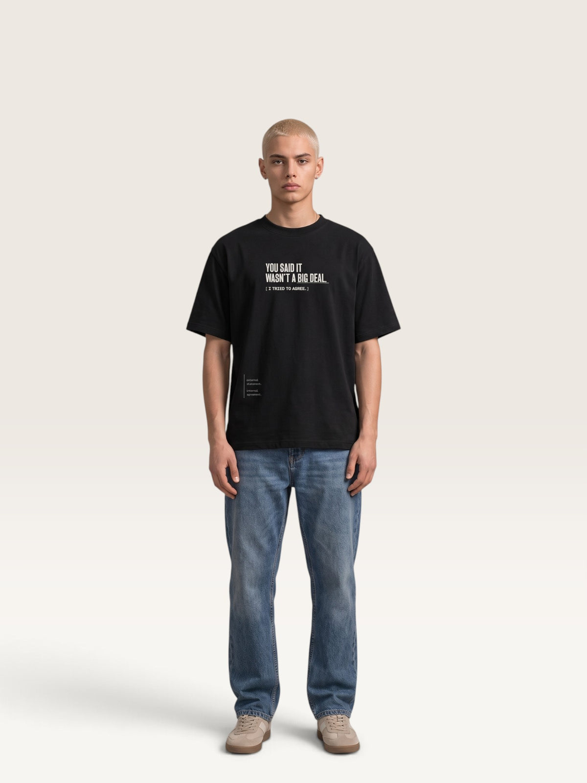 Black - heavyweight cotton oversized t-shirt with white IT WASN'T A BIG DEAL graphic print on the front