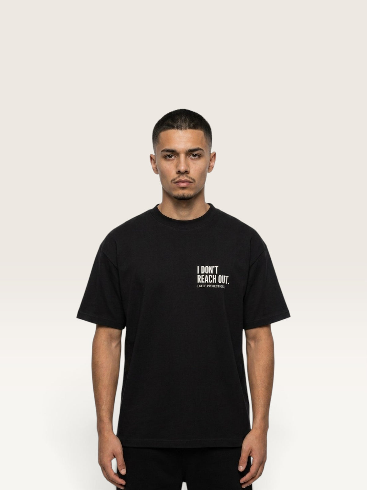 Black WEARCAPTION  heavyweight cotton oversized t-shirt with white I DON'T REACH OUT graphic print on the chest