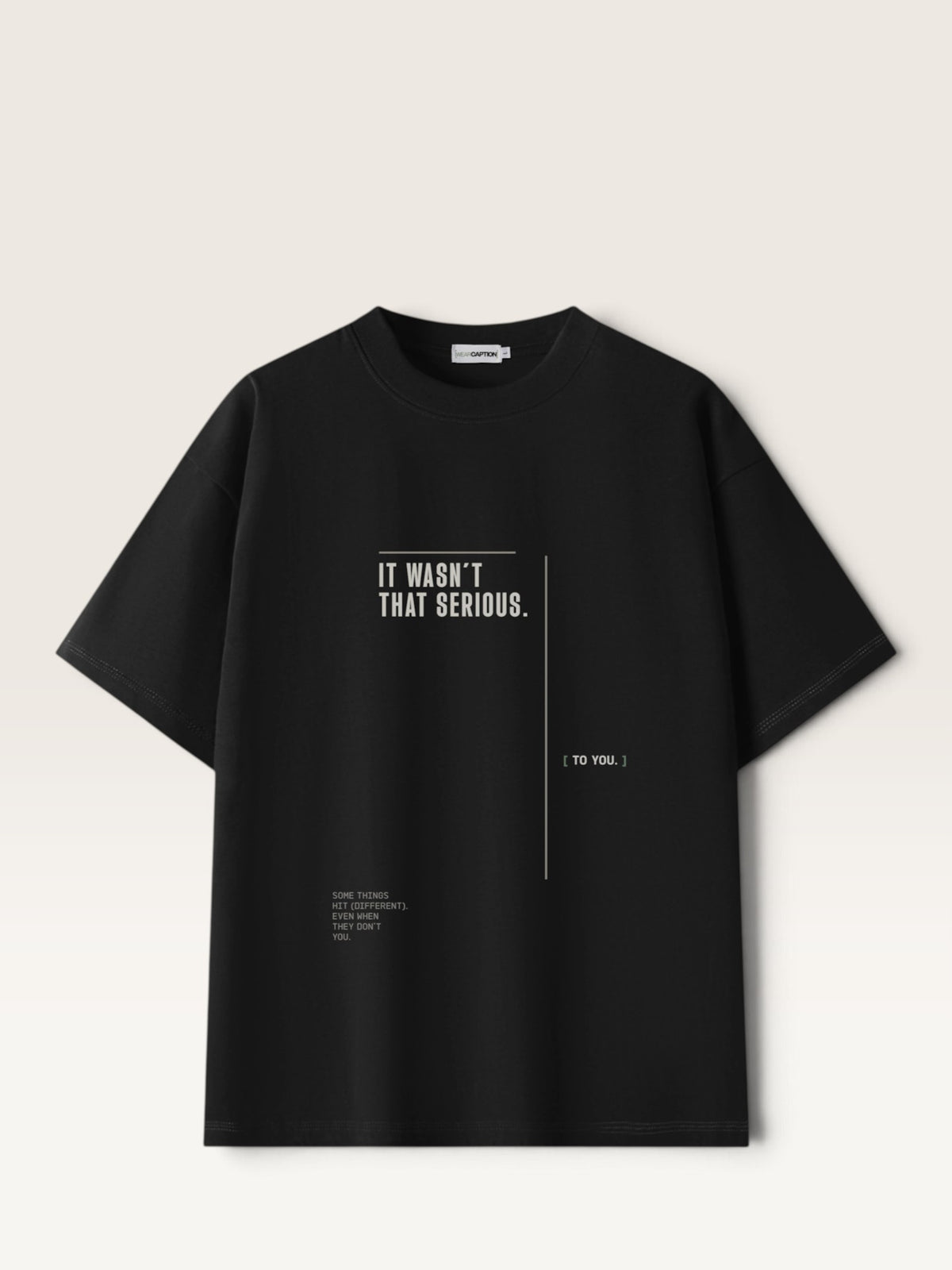 Black WEARCAPTION black heavyweight cotton oversized t-shirt with white typographic front print and boxy editorial fit.