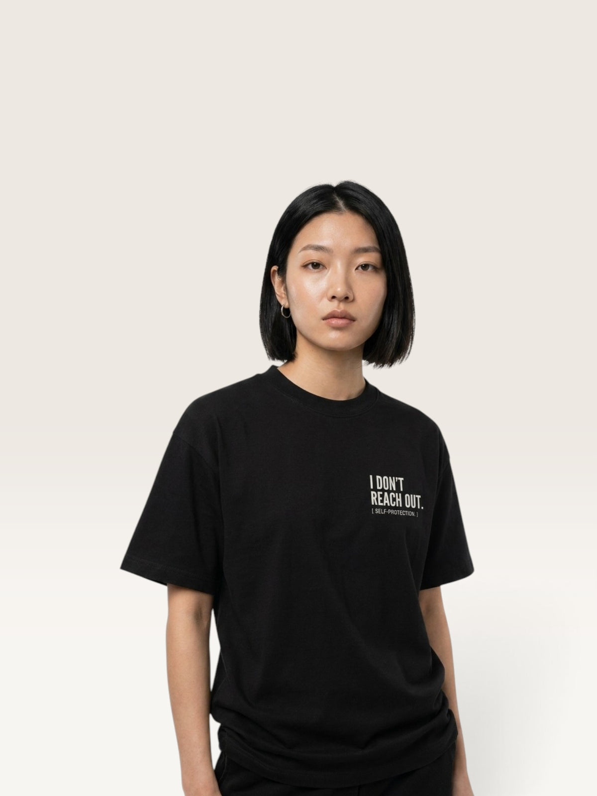 Black WEARCAPTION  heavyweight cotton oversized t-shirt with white I DON'T REACH OUT graphic print on the chest