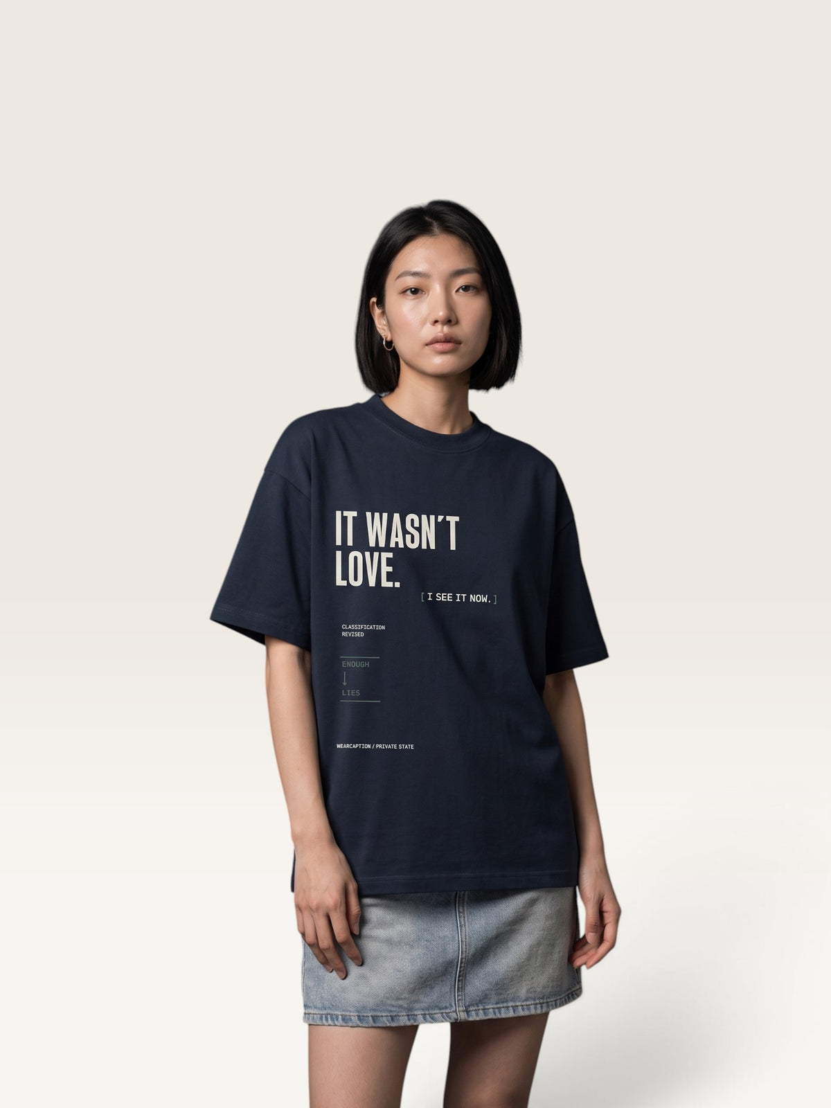 Navy Blue WEARCAPTION heavyweight cotton oversized t-shirt with white and green graphic text print on the back