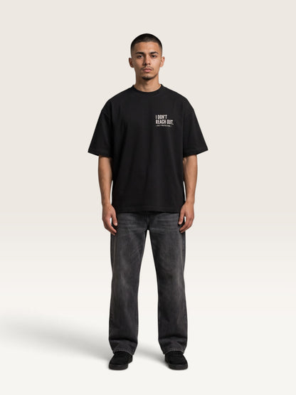 Black WEARCAPTION  heavyweight cotton oversized t-shirt with white I DON'T REACH OUT graphic print on the chest