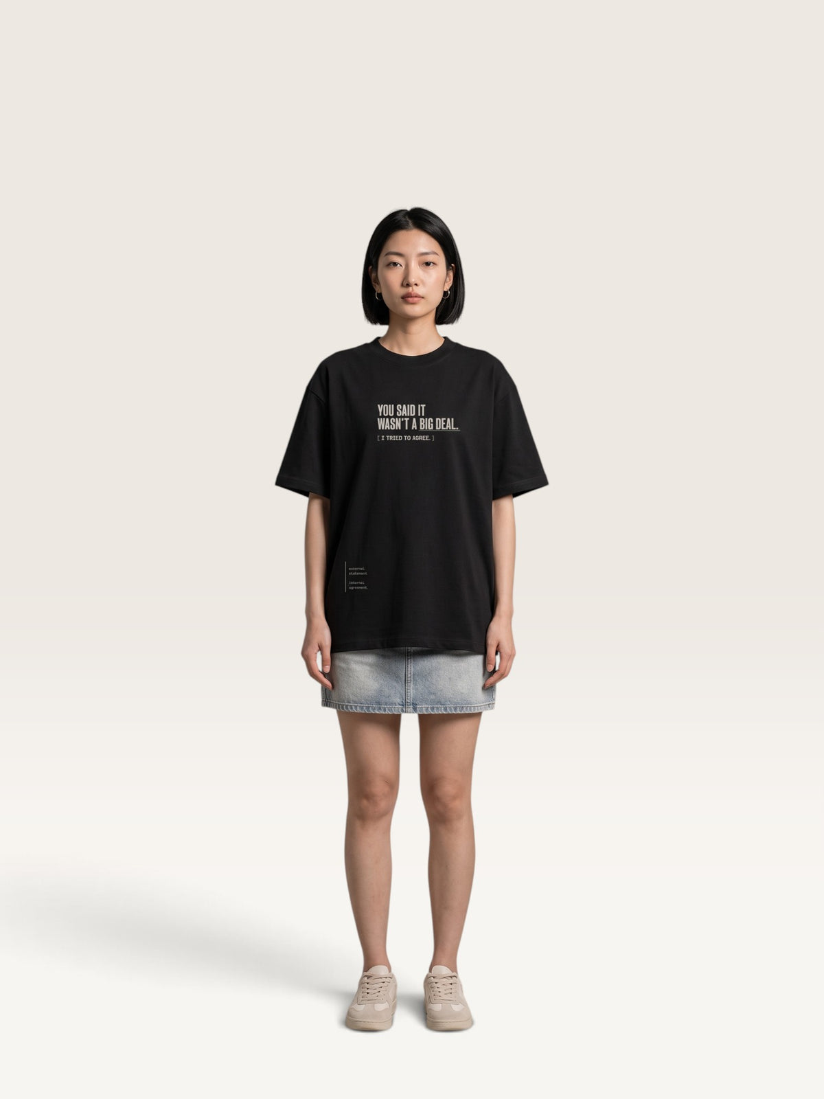 Black - heavyweight cotton oversized t-shirt with white IT WASN'T A BIG DEAL graphic print on the front