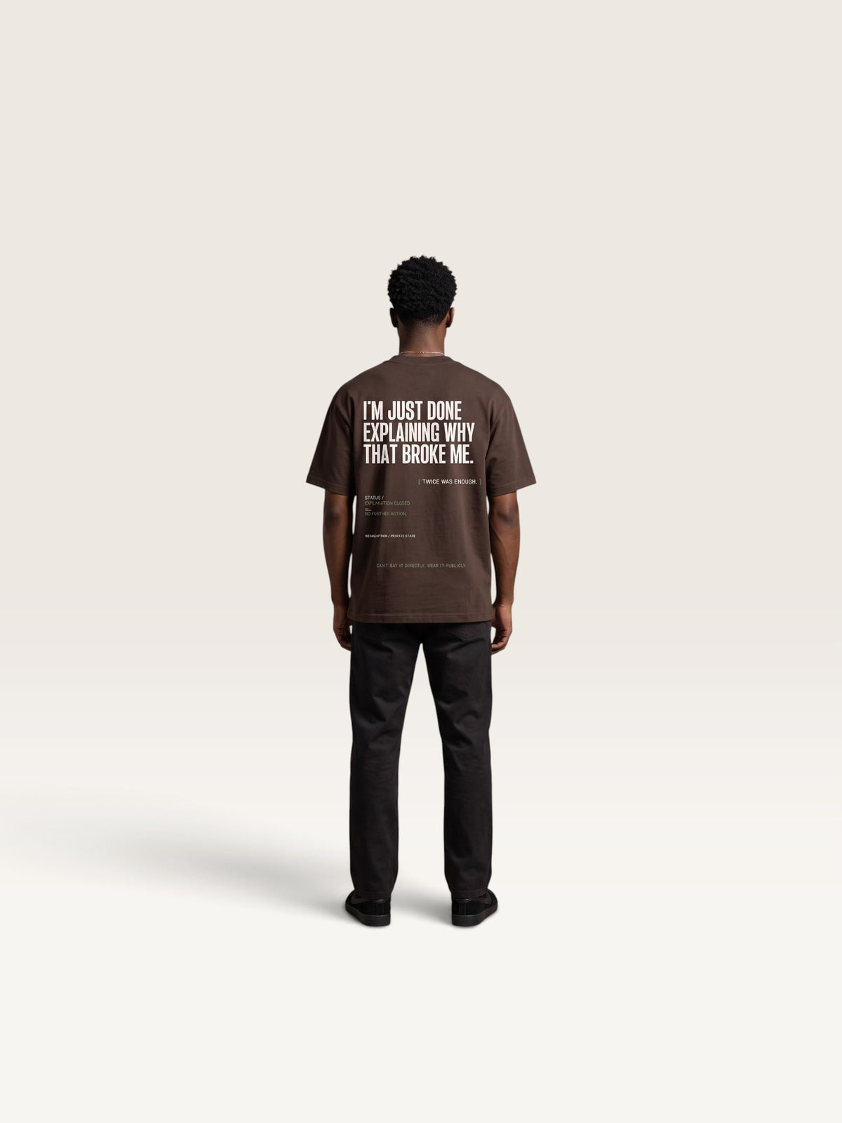 Coffee WEARCAPTION heavyweight cotton oversized t-shirt with white I'M NOT COLD graphic print on the chest.