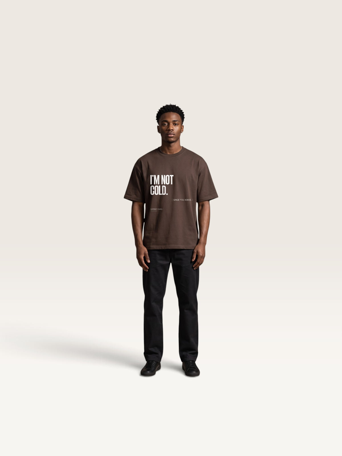 Coffee WEARCAPTION heavyweight cotton oversized t-shirt with white I'M NOT COLD graphic print on the chest.