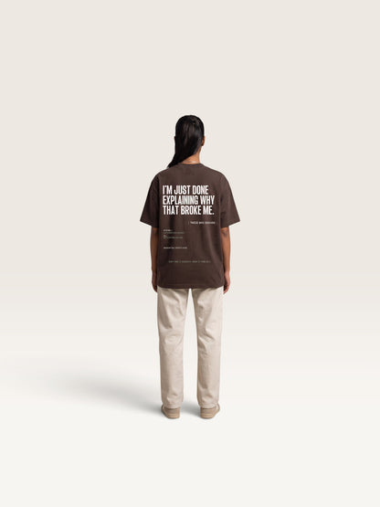 Coffee WEARCAPTION heavyweight cotton oversized t-shirt with white I'M NOT COLD graphic print on the chest.