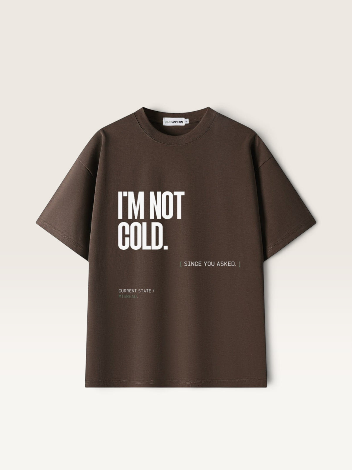 Coffee WEARCAPTION heavyweight cotton oversized t-shirt with white I'M NOT COLD graphic print on the chest.