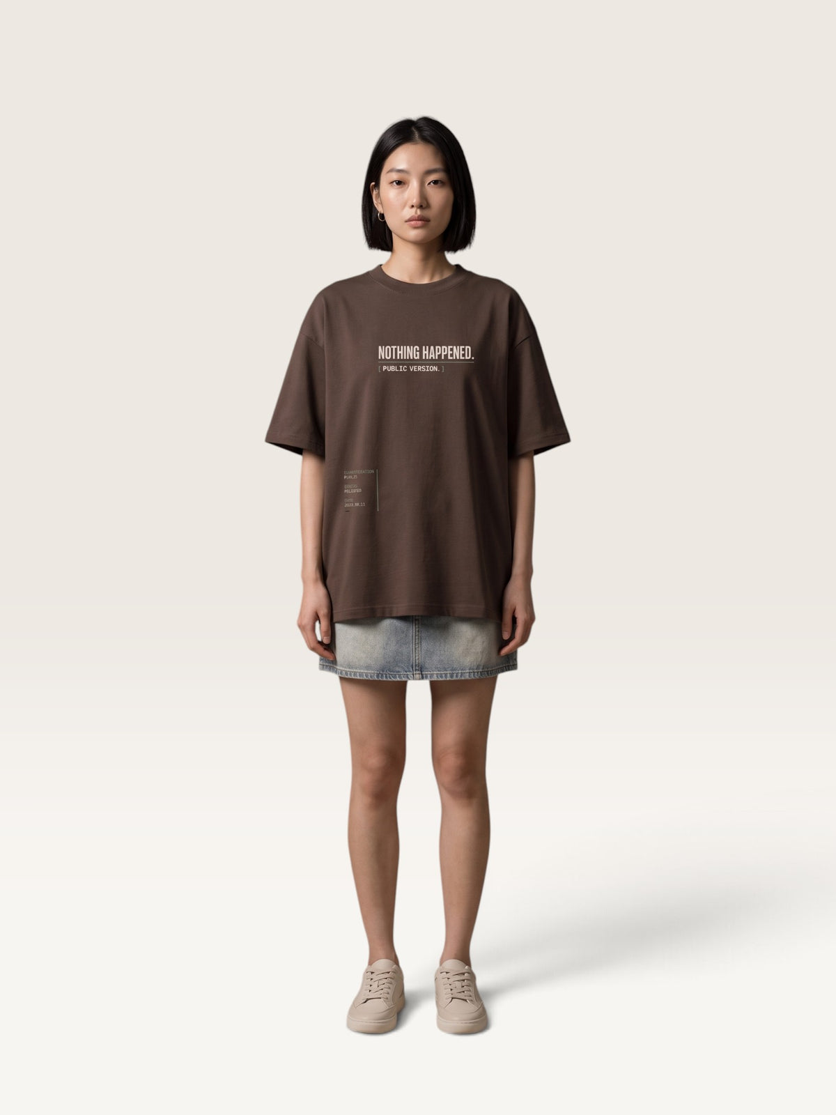 Coffee WEARCAPTION  heavyweight cotton oversized t-shirt with NOTHING HAPPENED PUBLIC VERSION graphic print