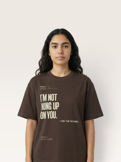 Coffee WEARCAPTION brown heavyweight cotton oversized t-shirt with cream text print on a model