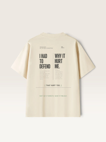 Mild Apricot WEARCAPTION heavyweight cream cotton t-shirt with black typographic back print featuring a reflective emotional message.