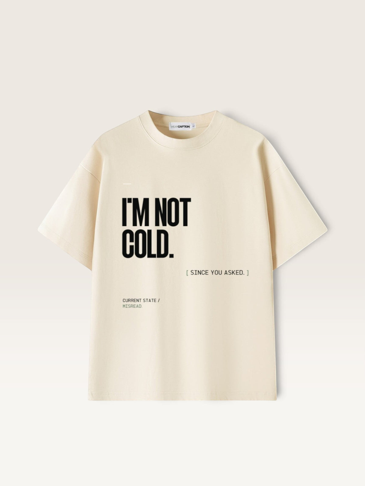 Mild Apricot WEARCAPTION heavyweight cotton oversized t-shirt with white I'M NOT COLD graphic print on the chest.