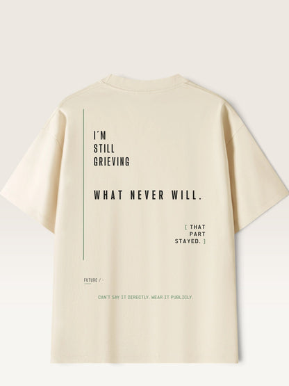 WEARCAPTION heavyweight cream cotton t-shirt with black typographic back print featuring I'M STILL GRIEVING text.