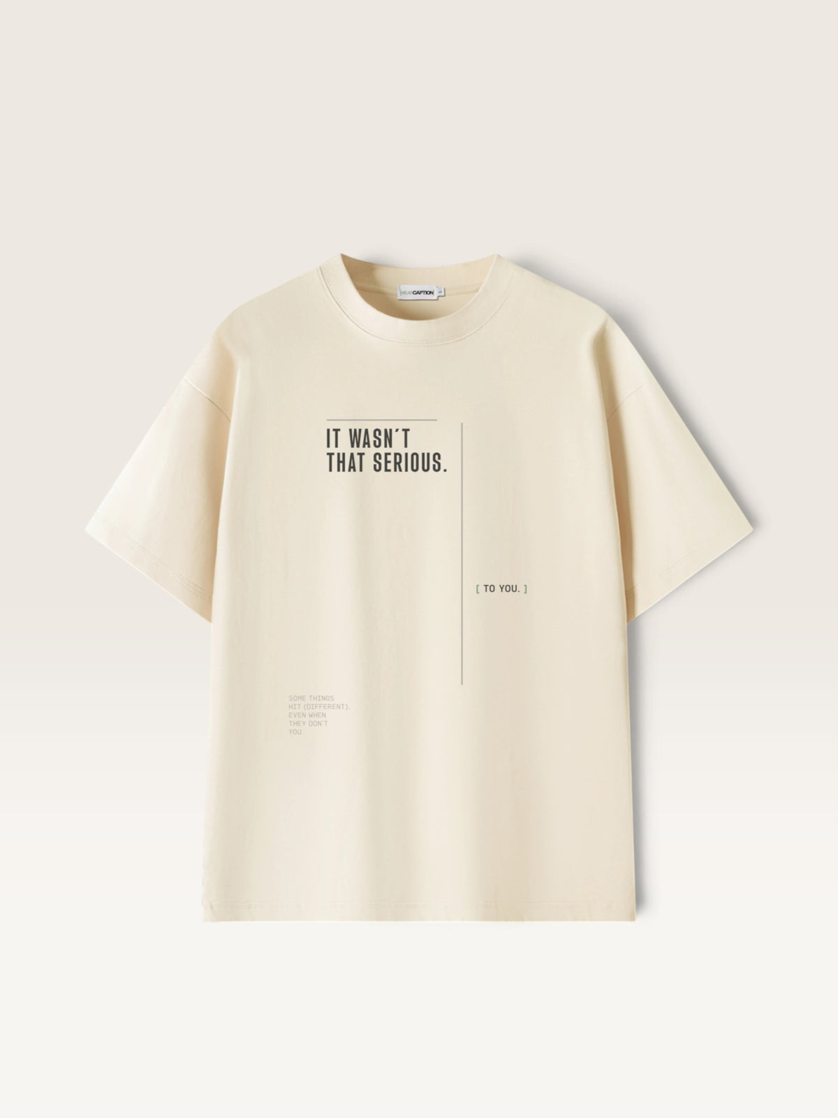 Mild Apricot WEARCAPTION heavyweight cream cotton t-shirt with IT WASN'T THAT SERIOUS graphic print in a boxy oversized fit