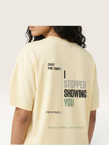 Apricot - heavyweight cotton oversized t-shirt with white NO HARD FEELINGS A LIE text print on the front