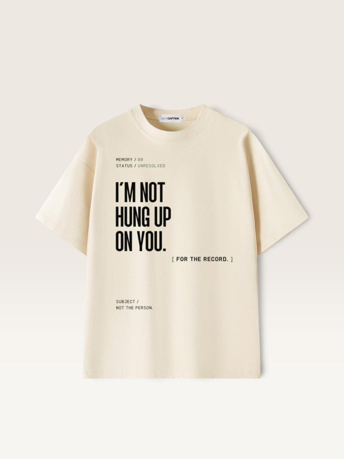 Mild Apricot WEARCAPTION heavyweight cream cotton t-shirt with black graphic text I'M NOT HUNG UP ON YOU in a boxy oversized fit
