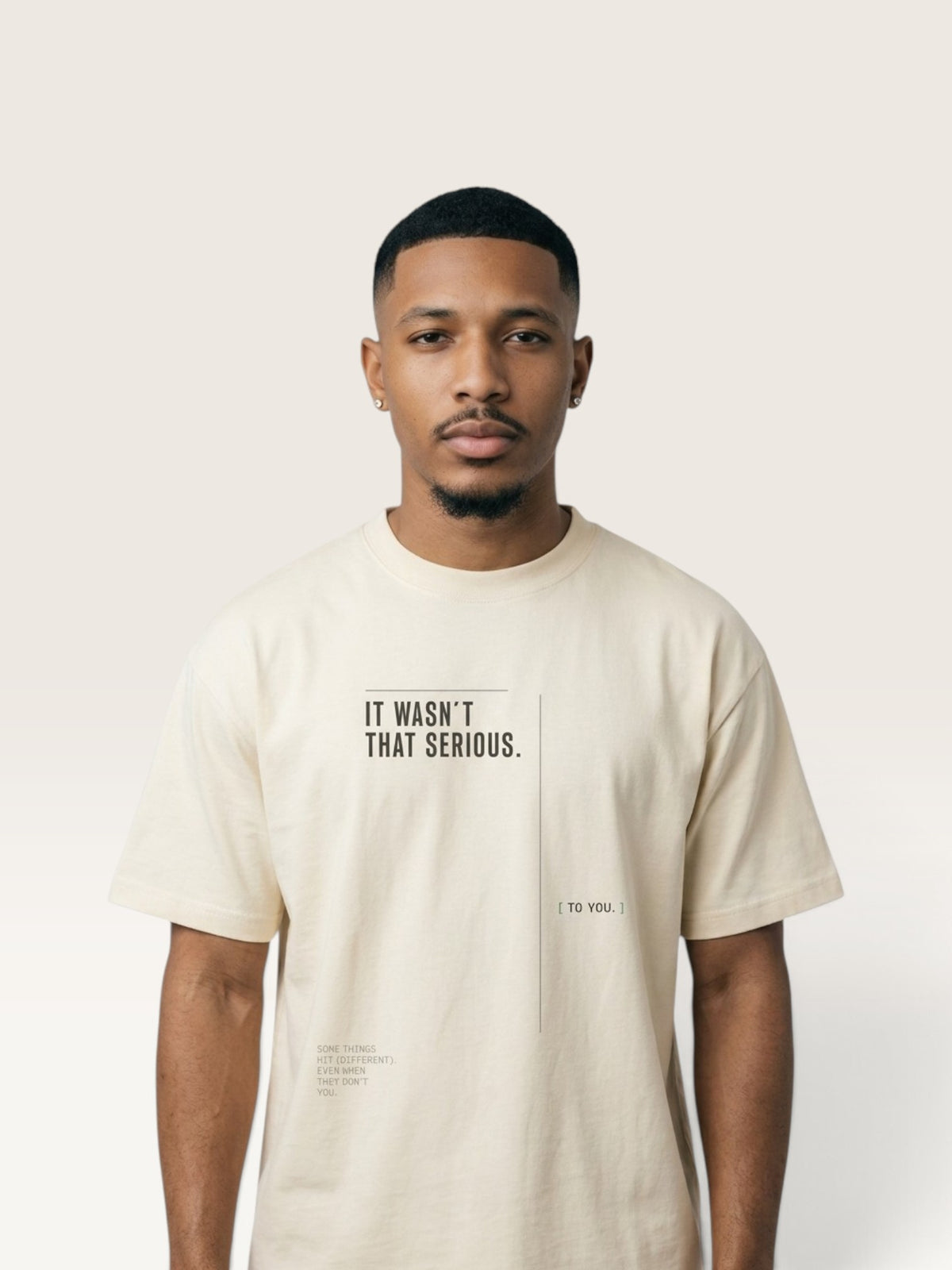 Mild Apricot WEARCAPTION oversized cream heavyweight cotton t-shirt with IT WASN'T THAT SERIOUS graphic print on the chest