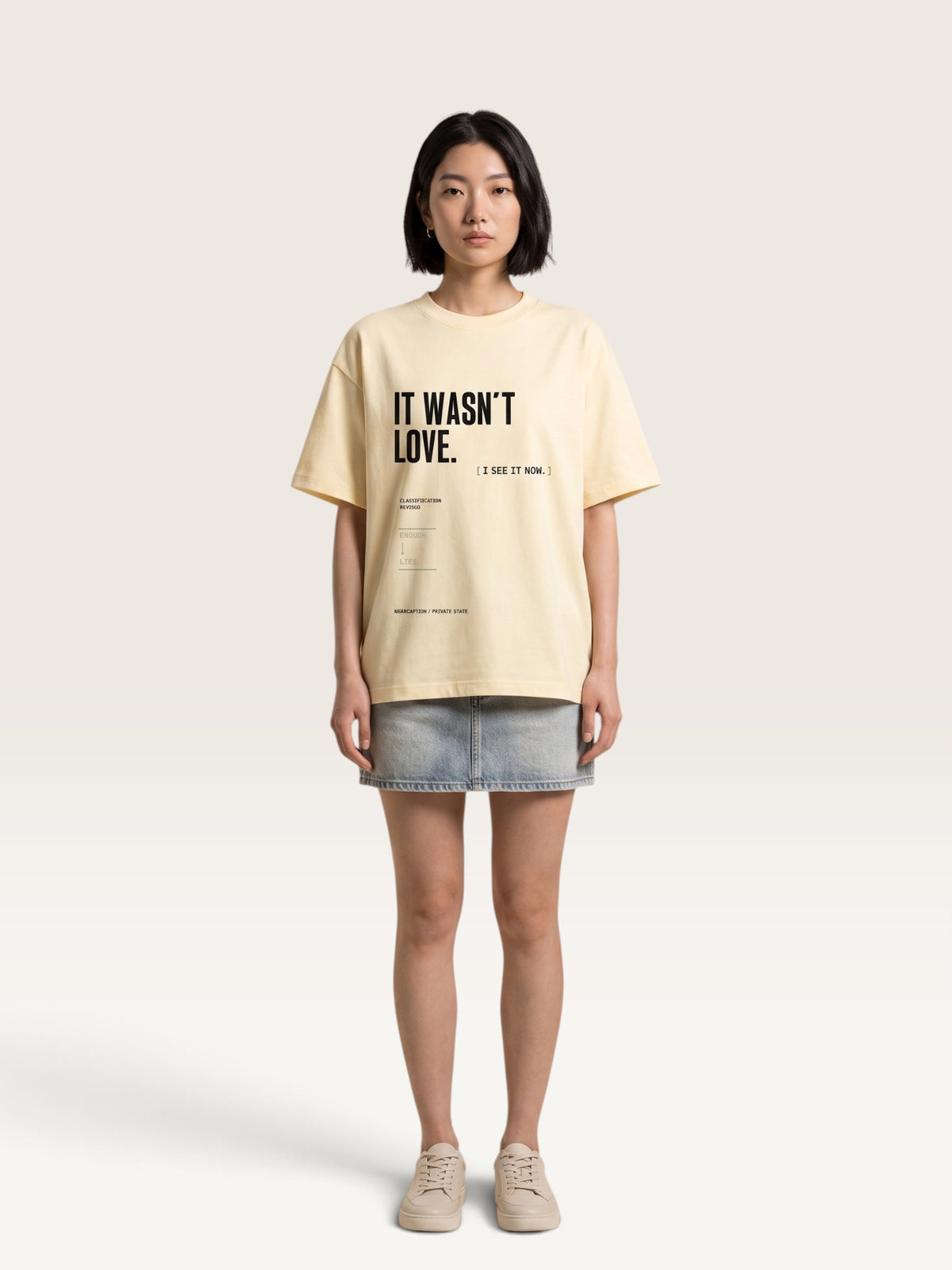 Apricot WEARCAPTION heavyweight cotton oversized t-shirt with white and green graphic text print on the back
