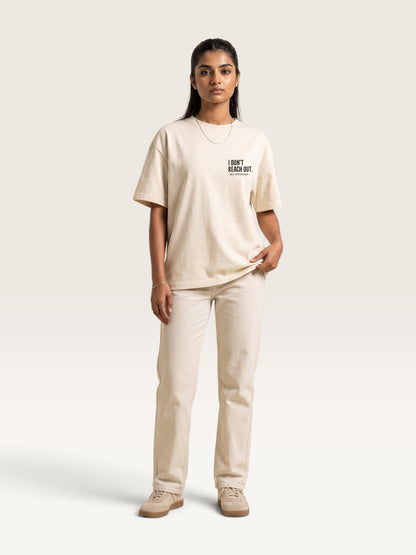 Mild Apricot  WEARCAPTION  heavyweight cotton oversized t-shirt with white I DON'T REACH OUT graphic print on the chest