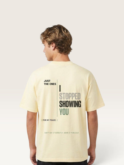 Apricot - heavyweight cotton oversized t-shirt with white NO HARD FEELINGS A LIE text print on the front