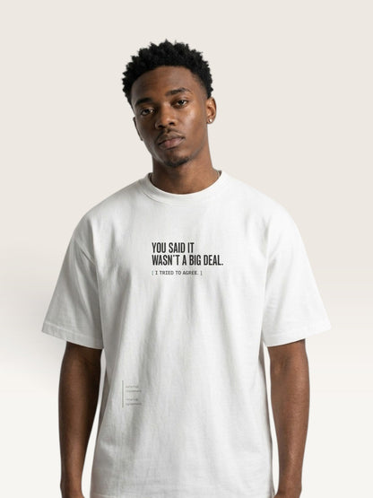 White - heavyweight cotton oversized t-shirt with white IT WASN'T A BIG DEAL graphic print on the front