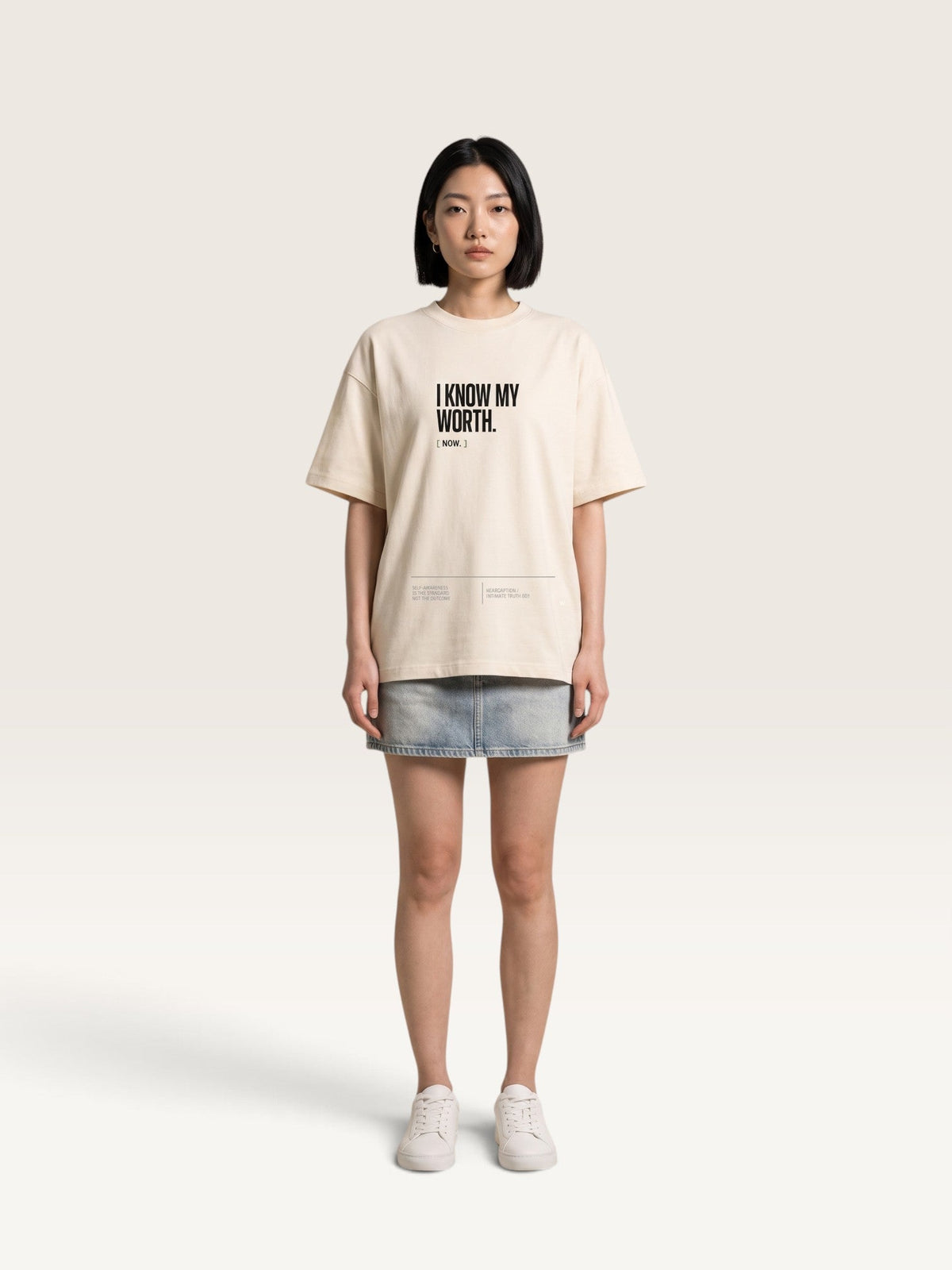 Mild Apricot WEARCAPTION  heavyweight cotton oversized t-shirt with white I KNOW MY WORTH graphic print on the front